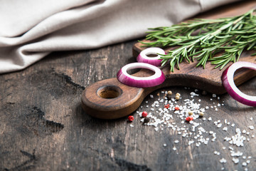 Mix of peppers with sea salt and rosemary. food background with copy space