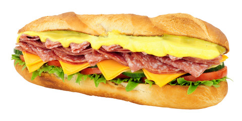 Salami and cheese filled baguette sandwich with fresh salad and mayonnaise isolated on a white background