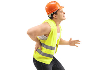 Construction worker experiencing back pain