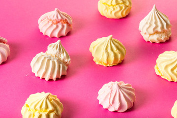 dessert meringue on pink