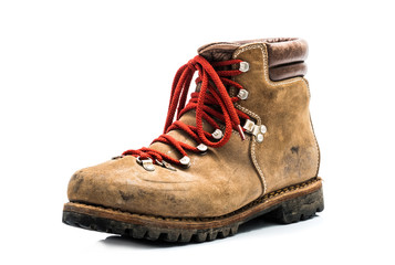 Old leather mountain shoe isolated on white background