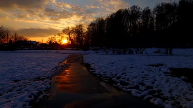 A path to a new day. Sunset. Winter park. New hope, new day.