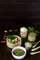 Oxtail soup in white dish on brown wood, Delicious Esan Thai food, Isan food