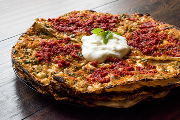 Turkish Kayseri Style Layers of Flat Bread with Minced Meat and Yogurt Yaglama.
