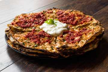 Turkish Kayseri Style Layers of Flat Bread with Minced Meat and Yogurt Yaglama.