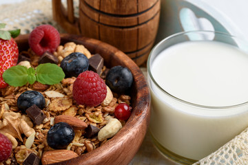 Granola with natural yogurt, fresh blueberries, nuts and honey, delicious breakfast or dessert.Healthy eating concept.