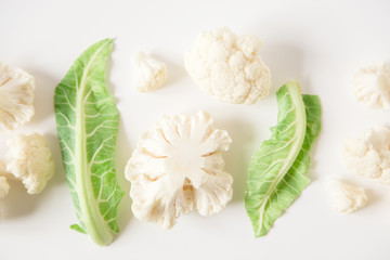 Obraz na płótnie Canvas fresh cauliflower.white background.creative style.top view