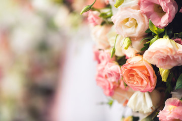 Close-up of a piece of floral wedding arch decoration.
