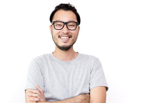 Closeup portrait of happy asian man face, isolated on white background with copy space.