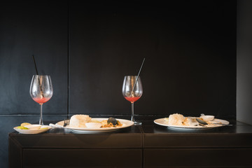 Remaining meal on black table