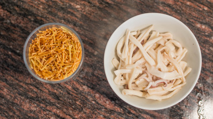 fideua noodles and squid (ingredients for fideua) cooking fideua with squid