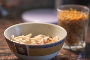 fideua noodles and squid (ingredients for fideua) cooking fideua with squid
