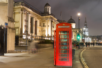 Red telephone box and the National Gallery in London, UK
