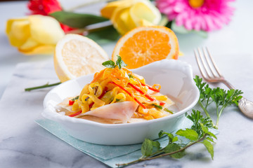 swordfish carpaccio  marinated with lemon orange and mint leaves