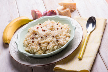 risotto with banana pink pepper and parmesan cheese