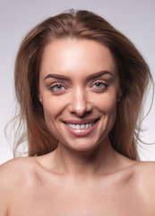 Fototapeta premium closeup portrait of beautyful blond smiling woman with clean fresh skin