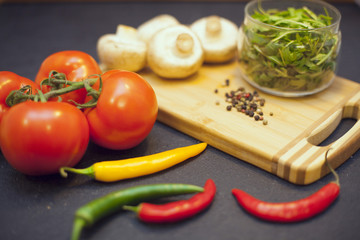 cooking ingredients on a black stone background
