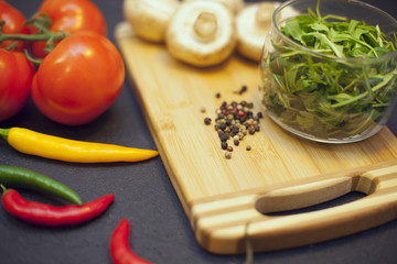 cooking ingredients on a black stone background