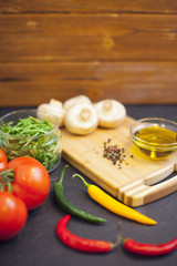 cooking ingredients on a black stone background