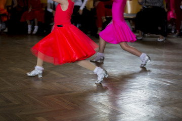 Partners legs in ballroom dance