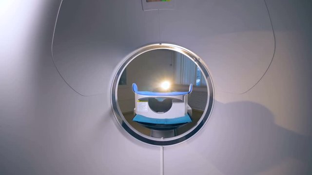 Modern hospital equipment. CT, MRI scanner, tomograph in a ction.