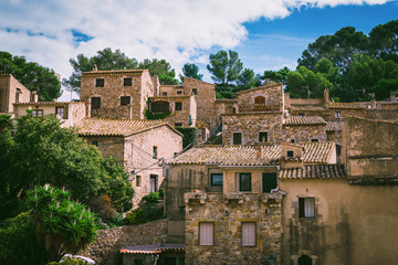 Fototapeta premium Ancient streets and yards of Tossa De Mar city, Catalonia, Spain, Europe