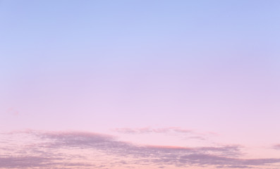 Blue and pink sky with clouds. Beautiful heaven.