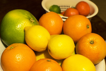 lot of citrus in a home setting, with natural light