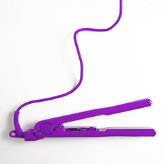 ceramic hair straightener and curling  isolated on white background