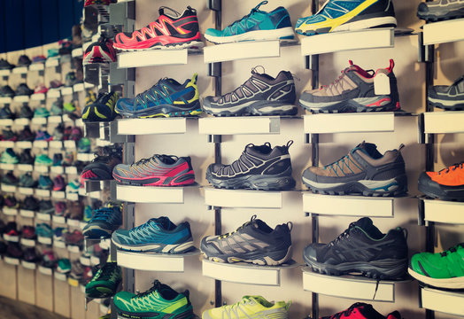 Image of large selection of sport shoes in store.
