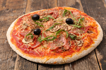 pizza with tomato sauce, ham and cheese