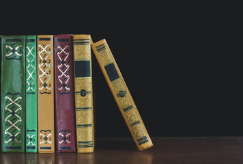 Old books on a black background