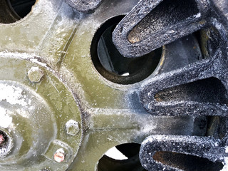 The wheel on the caterpillar of the tank