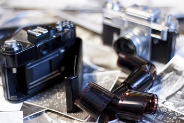 Retro camera on the table. Photographs and Photographic Film