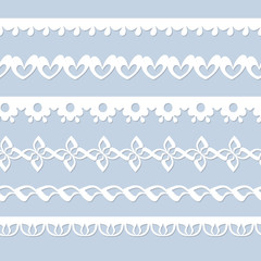 set of seamless paper laces on the blue background