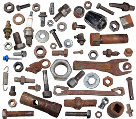 Old rusty bolts, nuts and mechanical parts isolated on white background