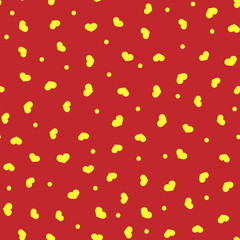 Romantic seamless pattern. Repeated golden hearts and polka dots on red background. Drawn by hand.