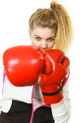Woman wearing boxing gloves