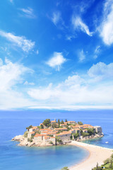 Naklejka na ściany i meble Beautiful view of the island-resort of St. Stefan (Sveti Stefan) on the Budva Riviera, Budva, Montenegro on a sunny day