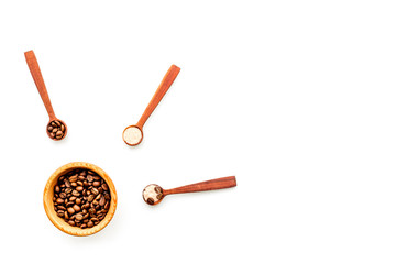 Aromatheraphy in spa. Chocolate brown spa salt on white background top view copy space