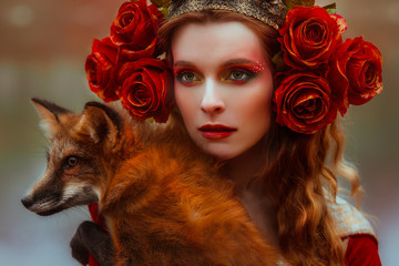 Woman in medieval clothes with a fox