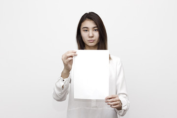 Astonished young girl holding two empty blank white board. Leaflet presentation. Pamphlet hold hands. Girl show clear offset paper. Sheet template. Booklet design sheet display read first person.