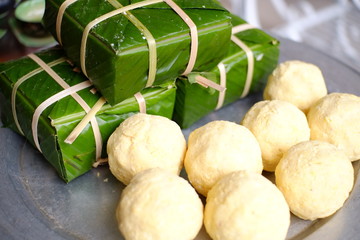 Packing Banh Chung (sticky rice cake), this is a traditional Vietnamese rice cake which is made from glutinous rice, mung beans, pork and other ingredients.