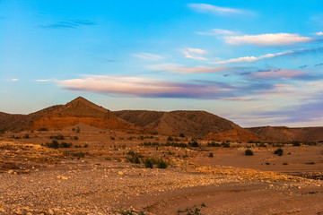Fototapeta na wymiar Muddy sandstone hills along the coastline of the Lake Mead, Lake Mead National Recreation Area, Nevada.