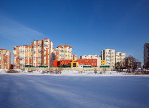A new residential district with kindergarten on the banks of the river Pekhorka. Balashikha, Moscow region, Russia.