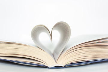 Book with love symbol isolated on white background