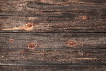 Wooden background. Wooden dark broun backdrop of horizontal boards. Natural pattern