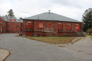 Fototapeta premium Abandoned brick asylum building