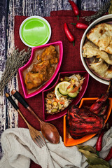 Traditional Indian food chicken tandoori and Tikka with garlic naan