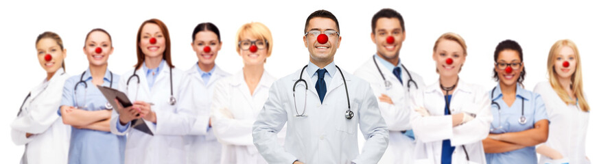 group of smiling doctors at red nose day